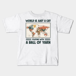 Funny crochet saying |  World is just a cat playing with a ball of yarn Kids T-Shirt